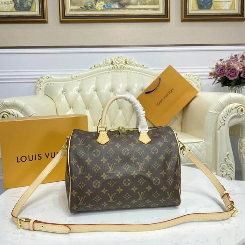 Lv belts replica The Speedy Louis Vuitton Monogram Speedy Bandouliere 30