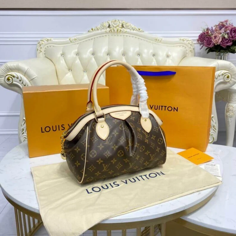 Replica bags Goldtone Louis Vuitton Monogram Tivoli PM