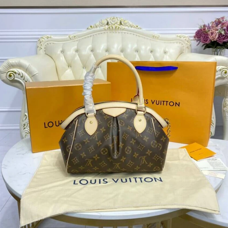 Replica bags Goldtone Louis Vuitton Monogram Tivoli PM