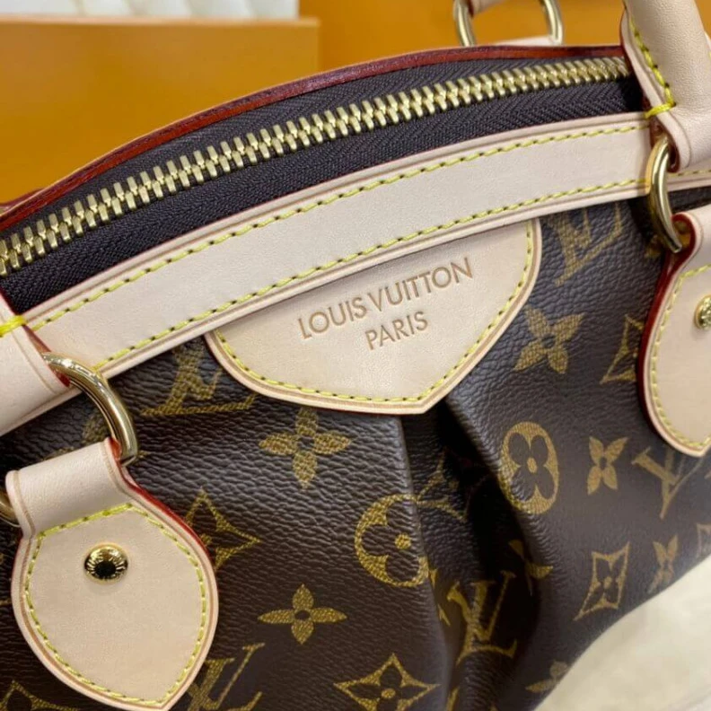 Replica bags Goldtone Louis Vuitton Monogram Tivoli PM