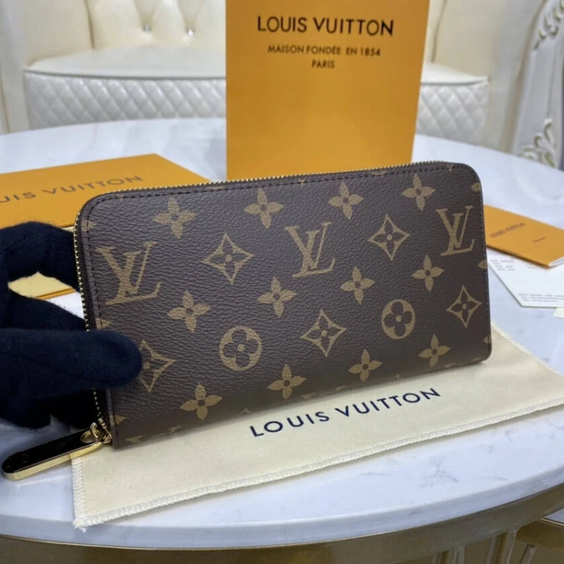 Lv belts replica Grained c Louis Vuitton Monogram Zippy Wallet Fuchsia