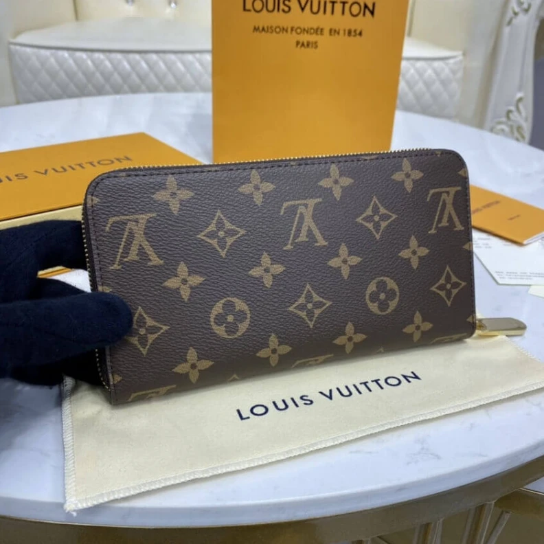 Lv belts replica Grained c Louis Vuitton Monogram Zippy Wallet Fuchsia