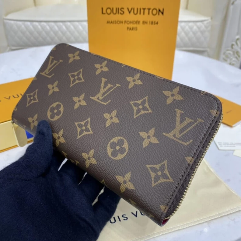 Lv belts replica Grained c Louis Vuitton Monogram Zippy Wallet Fuchsia