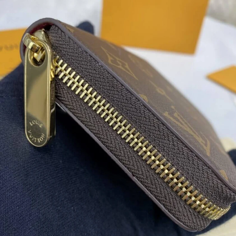 Lv belts replica Grained c Louis Vuitton Monogram Zippy Wallet Fuchsia