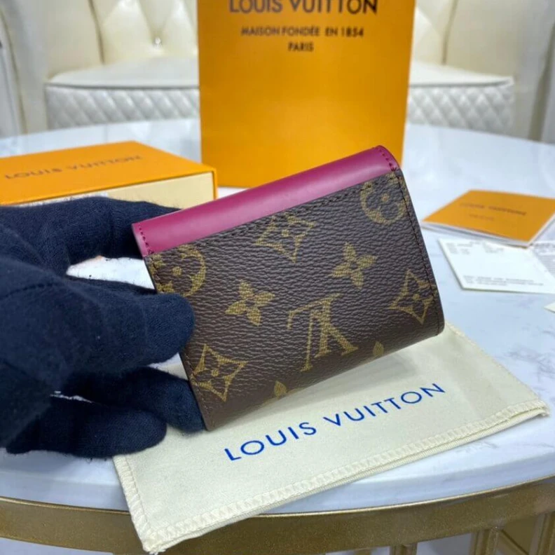 Lv belts replica 1 flat ba Louis Vuitton Monogram Zoe Wallet Fuchsia