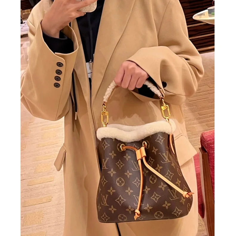 Replica bags Strap dro Louis Vuitton Monogram and Shearling Neonoe BB M46319