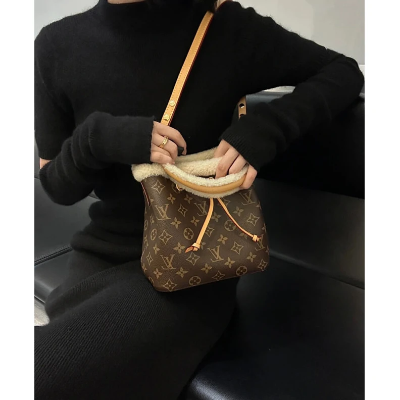 Replica bags Strap dro Louis Vuitton Monogram and Shearling Neonoe BB M46319