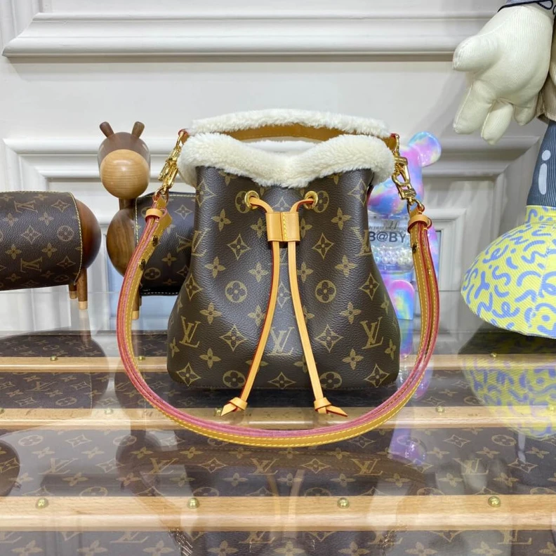 Replica bags Strap dro Louis Vuitton Monogram and Shearling Neonoe BB M46319