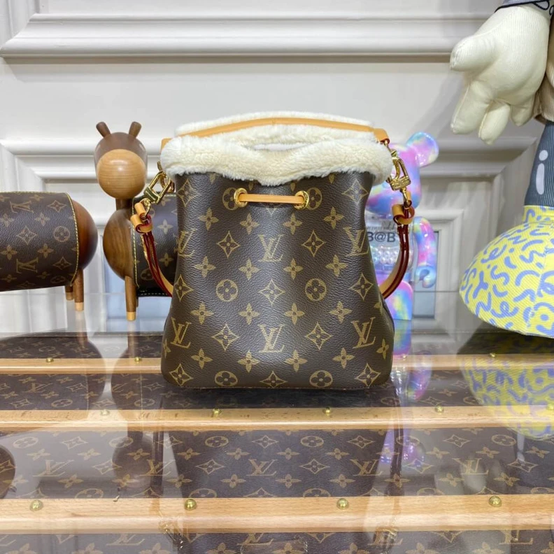 Replica bags Strap dro Louis Vuitton Monogram and Shearling Neonoe BB M46319