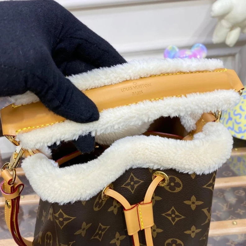 Replica bags Strap dro Louis Vuitton Monogram and Shearling Neonoe BB M46319