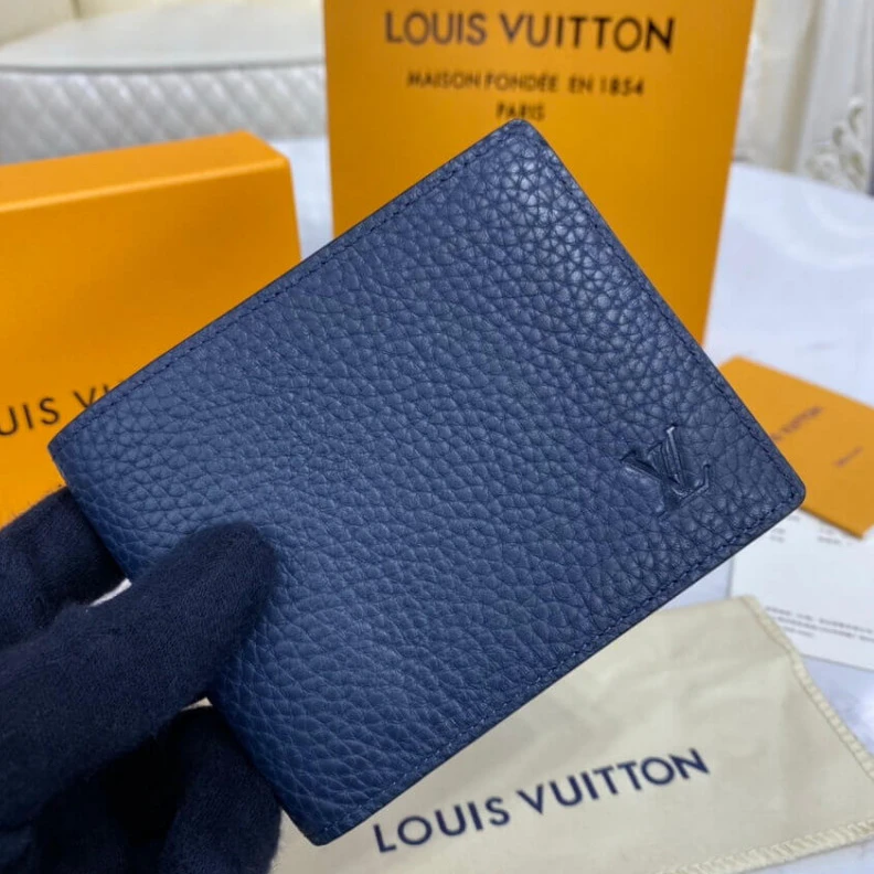 Louis vuitton locations Embossed Louis Vuitton Multiple Wallet