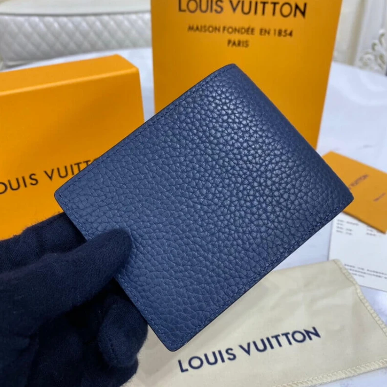Louis vuitton locations Embossed Louis Vuitton Multiple Wallet