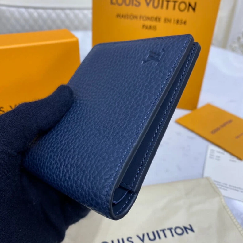 Louis vuitton locations Embossed Louis Vuitton Multiple Wallet