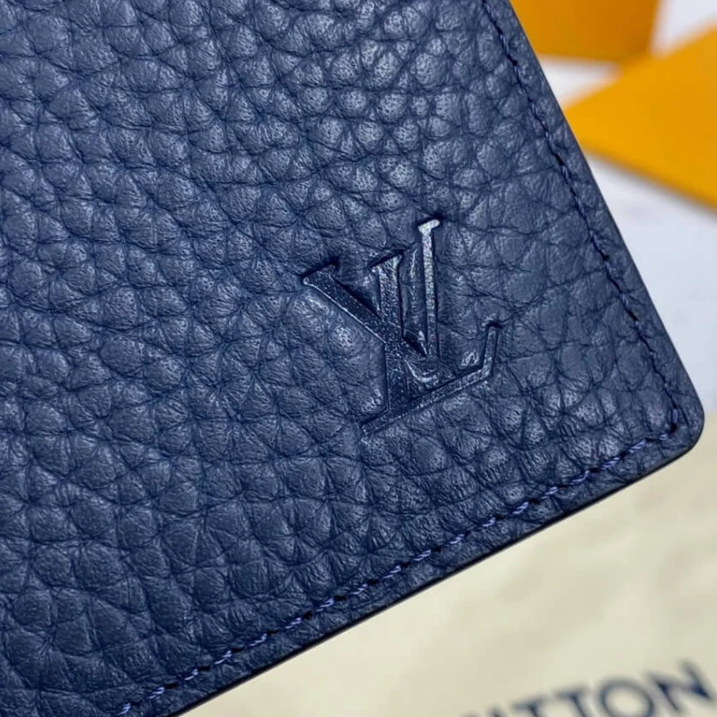 Louis vuitton locations Embossed Louis Vuitton Multiple Wallet