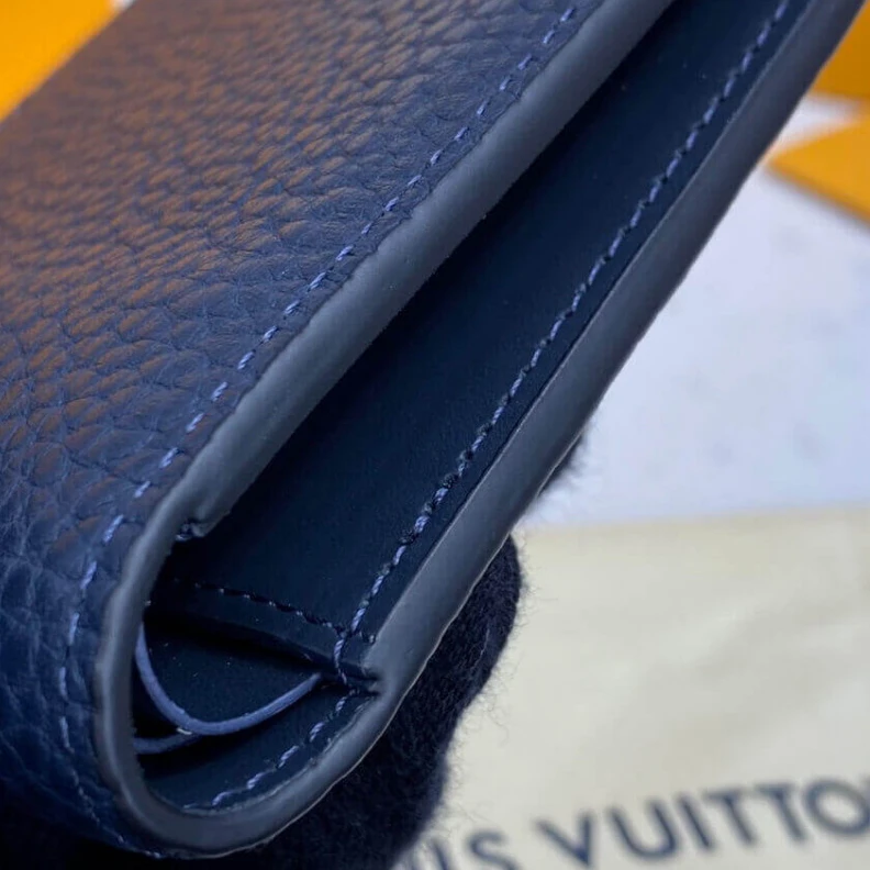 Louis vuitton locations Embossed Louis Vuitton Multiple Wallet