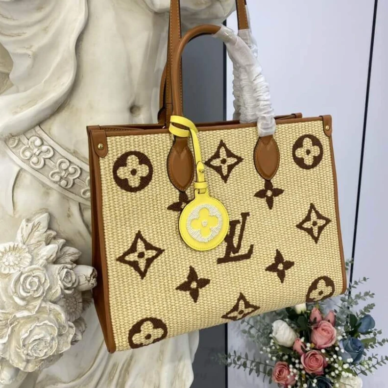 Replica bags 2 inside Louis Vuitton OnTheGo MM Tan
