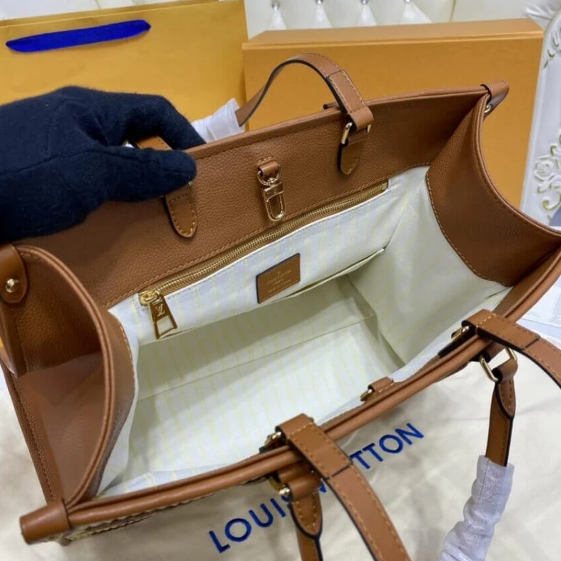 Replica bags 2 inside Louis Vuitton OnTheGo MM Tan