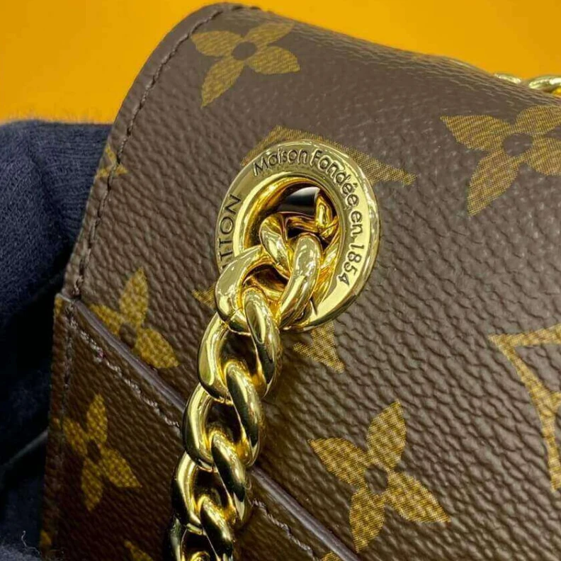 Mythick Smooth co Louis Vuitton Passy Bag