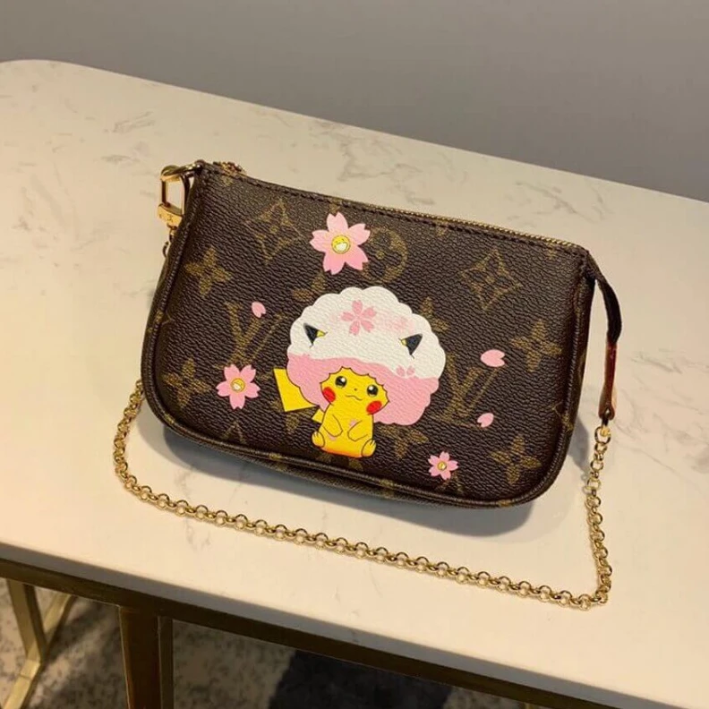 Louis vuitton locations Carried o LV Pikachu Print Mini Pochette Accessoires