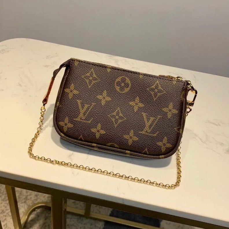 Louis vuitton locations Carried o LV Pikachu Print Mini Pochette Accessoires