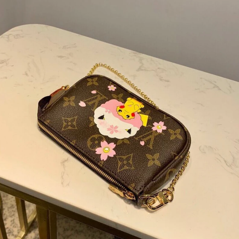 Louis vuitton locations Carried o LV Pikachu Print Mini Pochette Accessoires