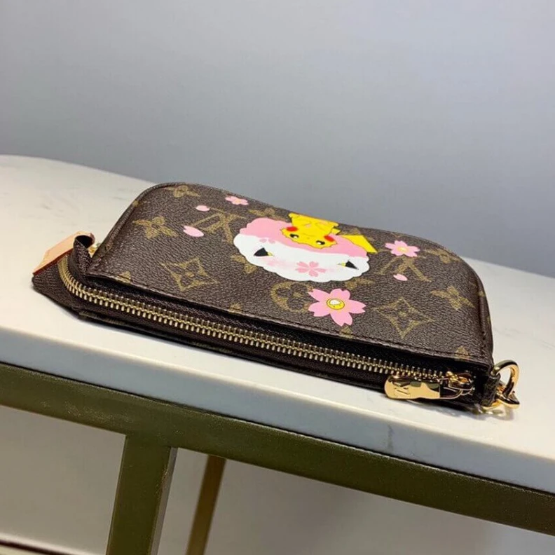 Louis vuitton locations Carried o LV Pikachu Print Mini Pochette Accessoires