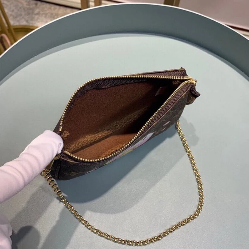 Louis vuitton locations Carried o LV Pikachu Print Mini Pochette Accessoires