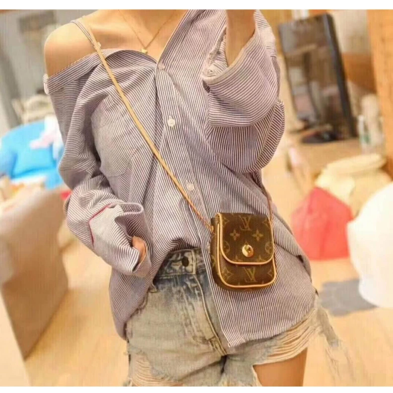 Lv belts replica This small LV Pochette Cancun Pouch