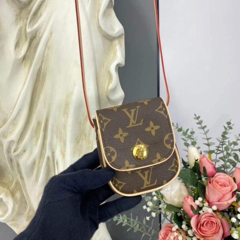Lv belts replica This small LV Pochette Cancun Pouch
