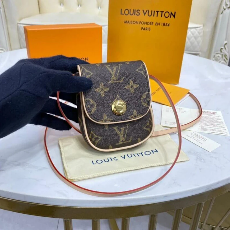 Lv belts replica This small LV Pochette Cancun Pouch