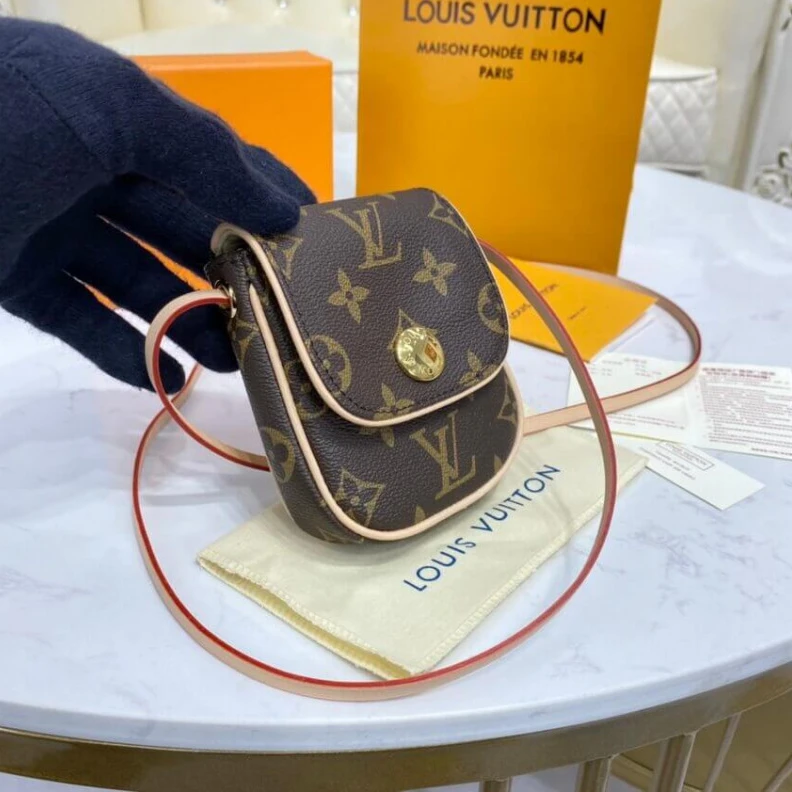Lv belts replica This small LV Pochette Cancun Pouch