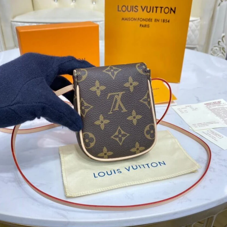 Lv belts replica This small LV Pochette Cancun Pouch