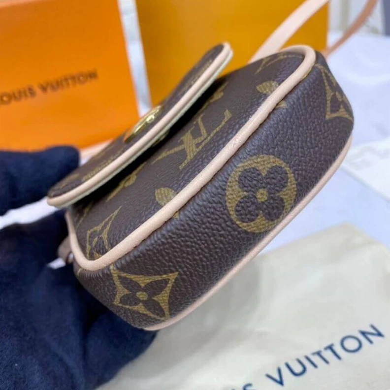 Lv belts replica This small LV Pochette Cancun Pouch