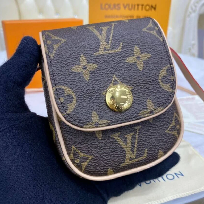 Lv belts replica This small LV Pochette Cancun Pouch