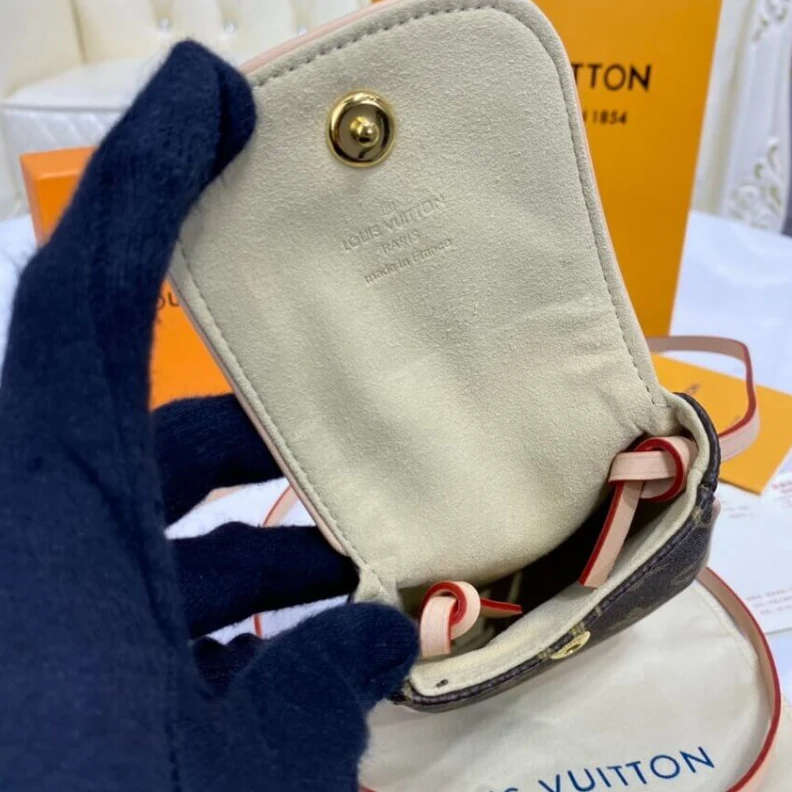 Lv belts replica This small LV Pochette Cancun Pouch