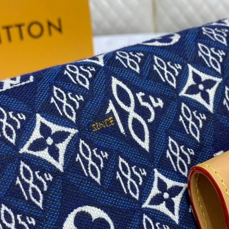 Replica bags Strap dro Louis Vuitton Since 1854 Dauphine MM