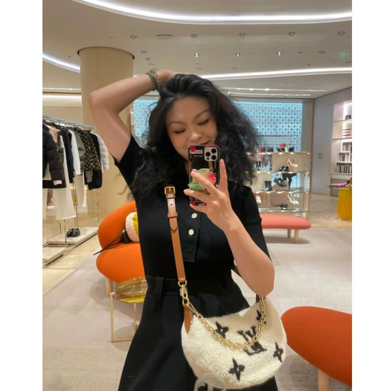 Replica bags 27.5 x 16 Louis Vuitton Ski Shearling Over The Moon Bag