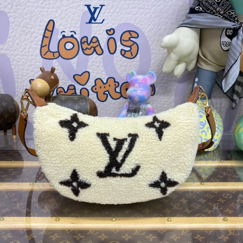 Replica bags 27.5 x 16 Louis Vuitton Ski Shearling Over The Moon Bag