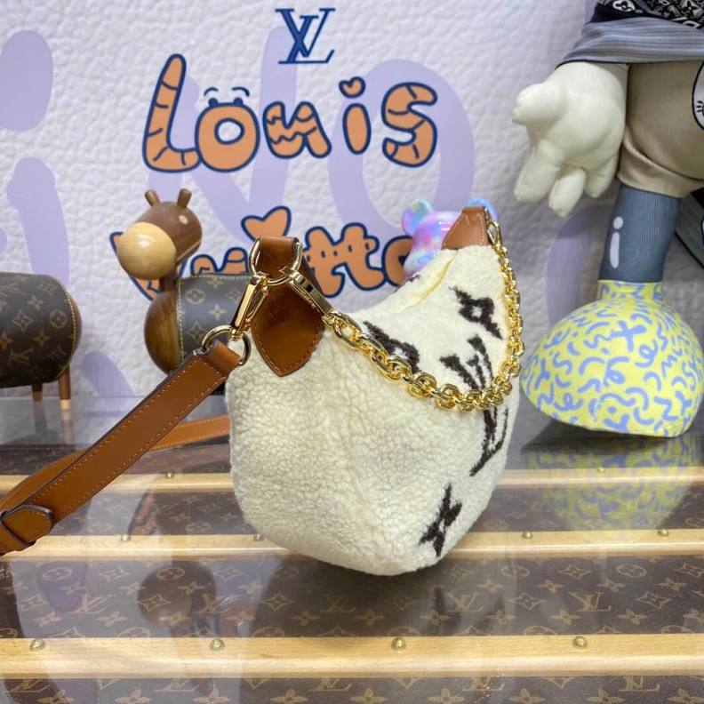 Replica bags 27.5 x 16 Louis Vuitton Ski Shearling Over The Moon Bag