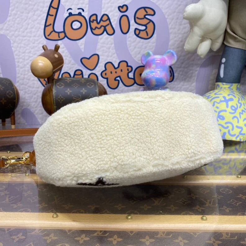 Replica bags 27.5 x 16 Louis Vuitton Ski Shearling Over The Moon Bag