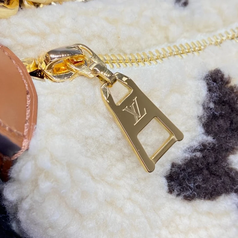 Replica bags 27.5 x 16 Louis Vuitton Ski Shearling Over The Moon Bag