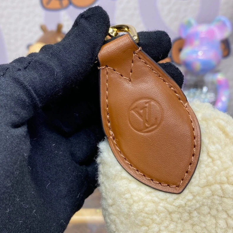Replica bags 27.5 x 16 Louis Vuitton Ski Shearling Over The Moon Bag