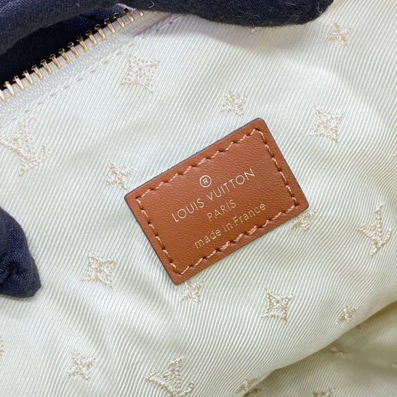 Replica bags 27.5 x 16 Louis Vuitton Ski Shearling Over The Moon Bag
