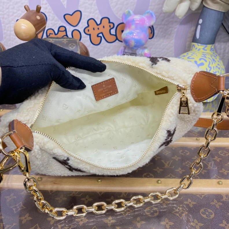 Replica bags 27.5 x 16 Louis Vuitton Ski Shearling Over The Moon Bag