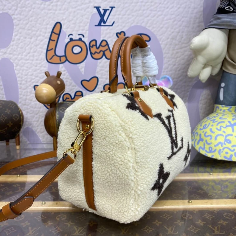 Replica bags lv Strap dro Louis Vuitton Ski Shearling Speedy Bandouliere 25