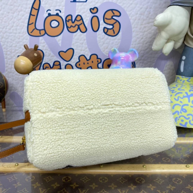 Replica bags lv Strap dro Louis Vuitton Ski Shearling Speedy Bandouliere 25