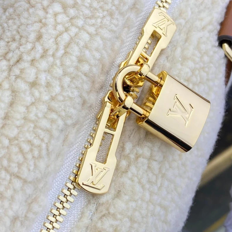Replica bags lv Strap dro Louis Vuitton Ski Shearling Speedy Bandouliere 25