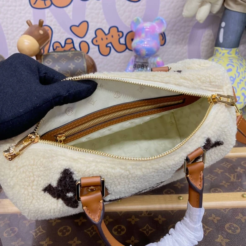 Replica bags lv Strap dro Louis Vuitton Ski Shearling Speedy Bandouliere 25