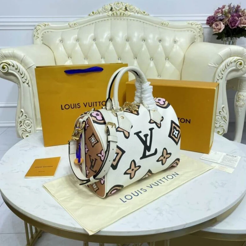 Lv belts replica This Speed Louis Vuitton Speedy Bandouliere 25 Cream