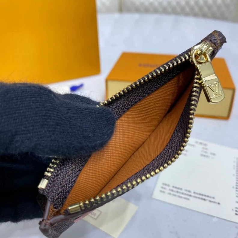 Louis vuitton locations Flat comp Louis Vuitton StellaLou Rabbit Coin & Card Holder